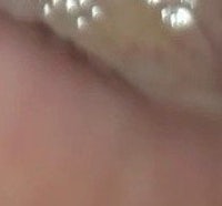 a close up of a person's ear