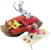 a toy couch with stuffed animals on it